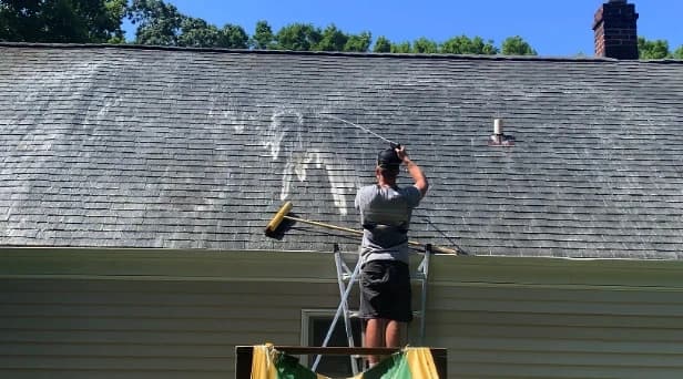 Before and after results of roof washing by North Olmsted Power Washing in North Olmsted